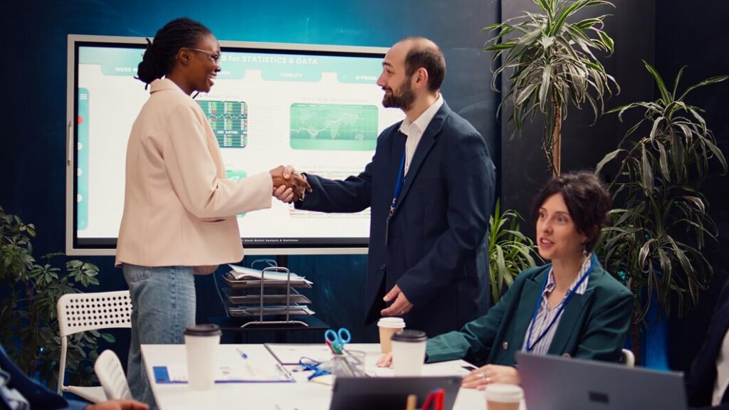 Top 10 Sales Outsourcing Companies in Georgia 2025: Boost Your Business Growth 1 business manager does handshake with new employee briefing meeting 482257 91048