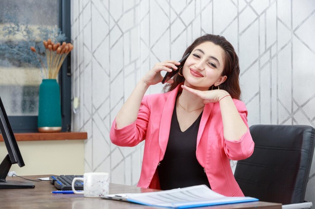 Top 10 Telemarketing Lead Generation Firms in the USA (2025): Boost Your Business Today 2 cheerful young lady talking phone smiling camera 144627 76744