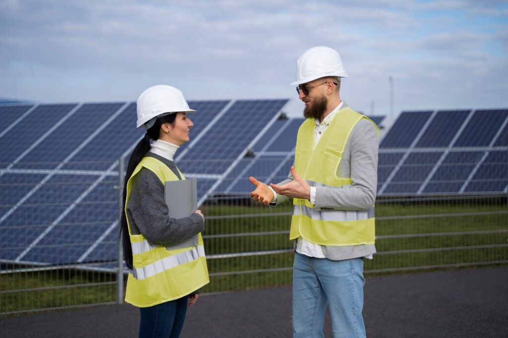 Top 10 Commercial Solar Lead Generation Services in the USA (2025) 9 medium shot engineers talking outside 23 2149352219