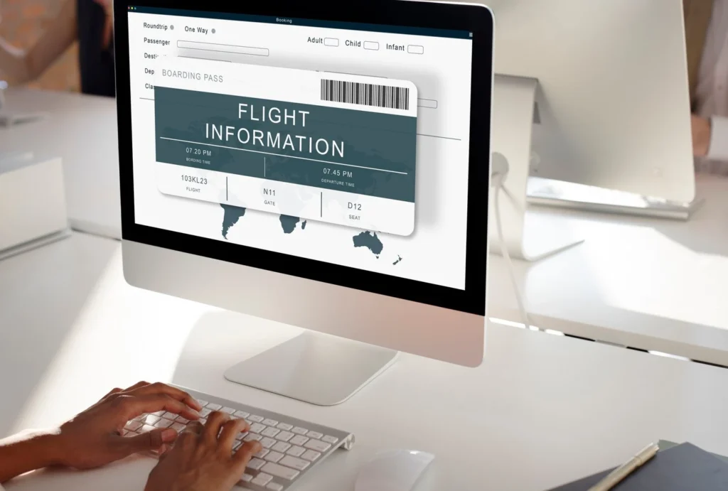 Email Marketing For Logistics 33 Professional using computer showing flight information interface for automated email sequence engagement