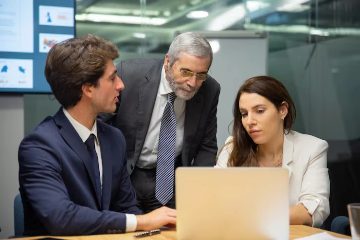 Professional business team discussing lead generation strategies in modern Chicago office meeting room