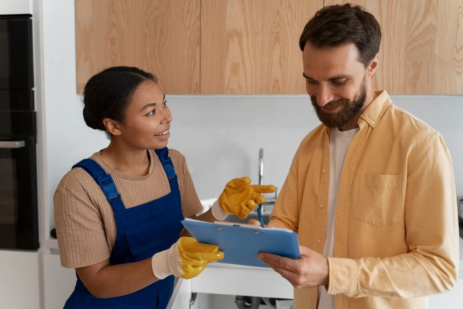 Email Marketing For Janitorial Services 60 Janitorial service provider discussing contract details with building manager in modern facility