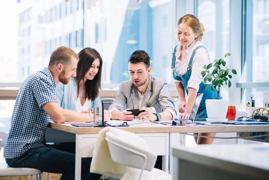 Email Marketing for Cannabis Brands 39 Team of professionals collaborating on cannabis email marketing content creation in modern office setting
