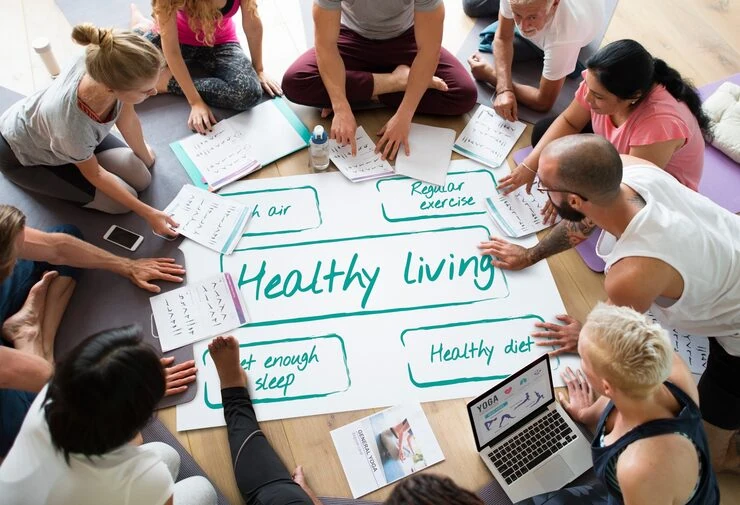 Email Marketing For Healthcare 37 Healthcare content team collaborating on healthy living educational materials and mind maps on floor