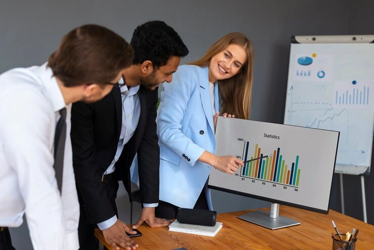 Email Marketing For Healthcare 39 Marketing team analyzing campaign performance statistics on monitor with colorful data charts